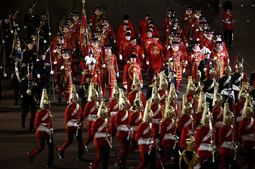 Members of the military take part in a full overnight dress rehearsal of the Coronation Ceremony.