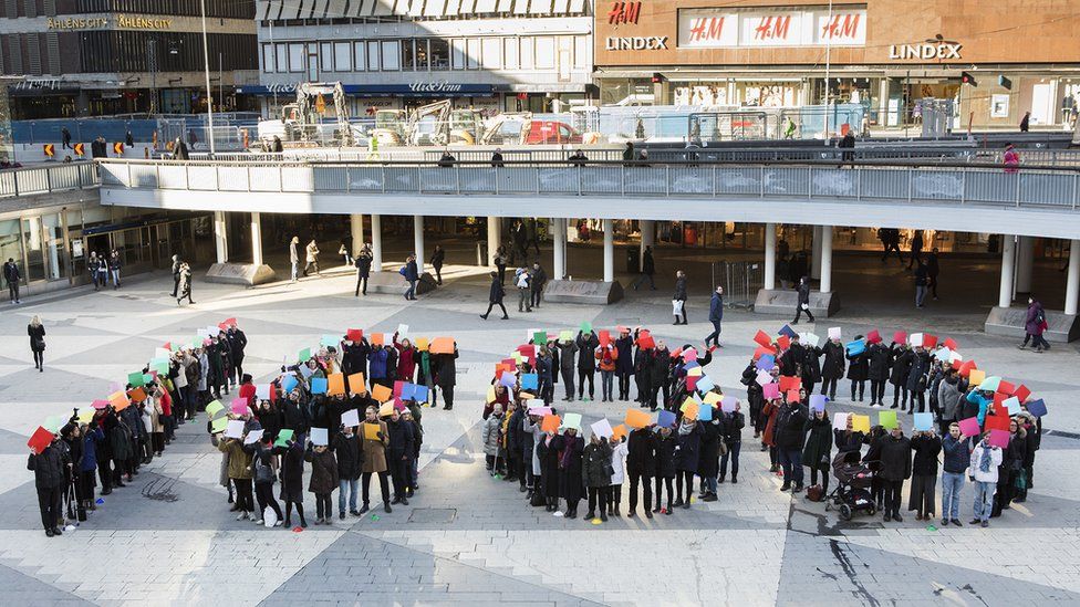 Women line up in Stockholm's central square to form the figure 1600, 15 Feb 17