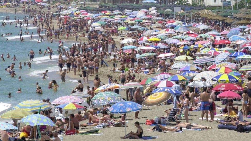 A crowded beach at Benalmadena on the Costa del Sol in Spain