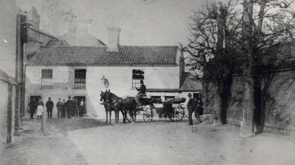 Horse and carriage at Smith's Corner on the boundary of the estate in the 1880s