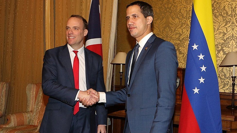 Venezuelan Opposition leader Juan Guaido (R) during a meeting with British Foreign Secretary Dominic Raab (L) at the Foreign Office in London, Britain, 21 January 2020