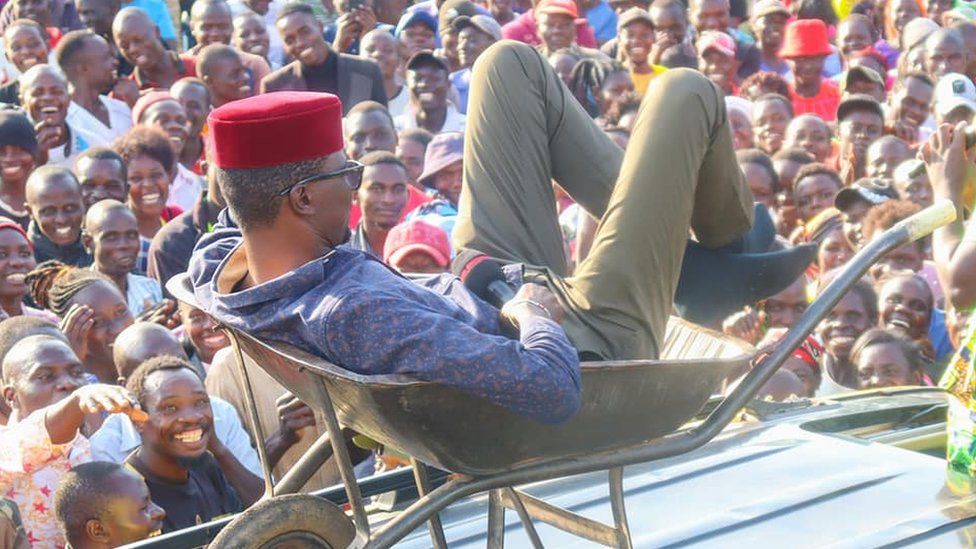 MP Didmus Barasa in a wheelbarrow