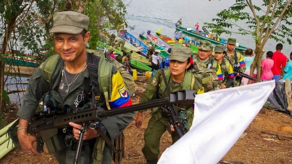 FARC guerrillas disembark to hand on their weapons in the remote area of Gallo, Cordoba department, Colombia on February 2, 2017