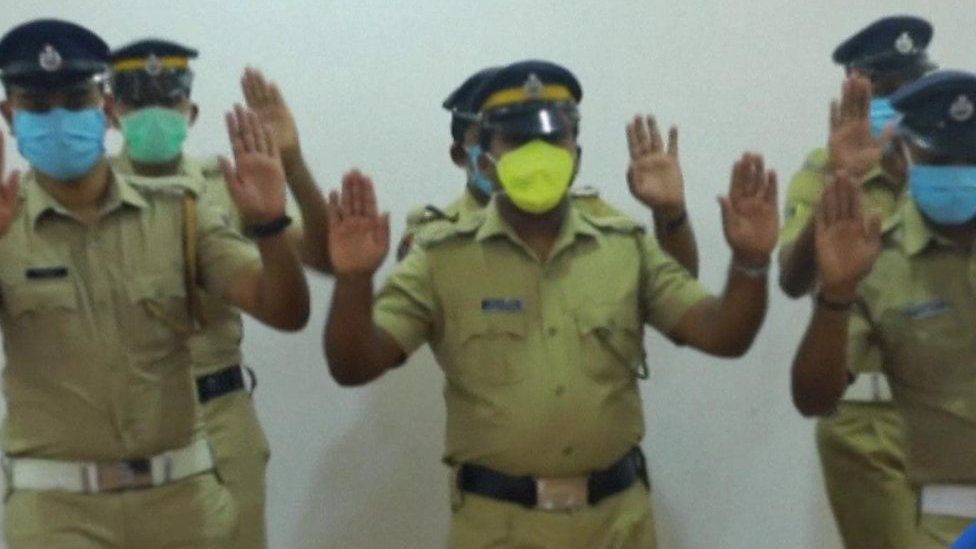 Indian policemen dancing