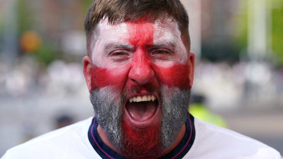 A fan in face paint in Market Square in Nottingham before the Euro2020 quarter final match between England and Ukraine.