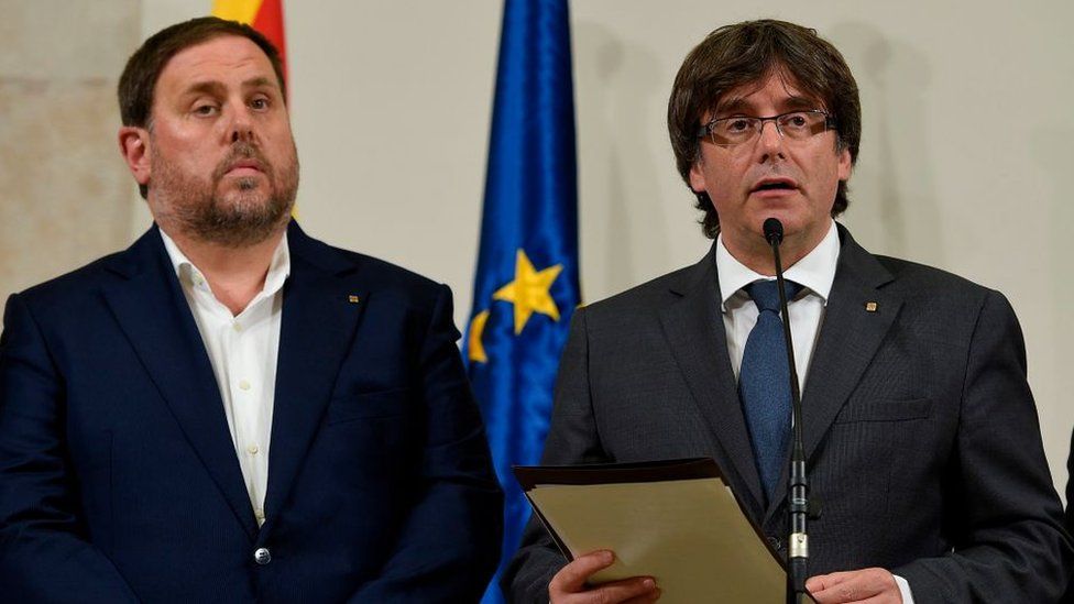 Oriol Junqueras, left, and Carles Puigdemont