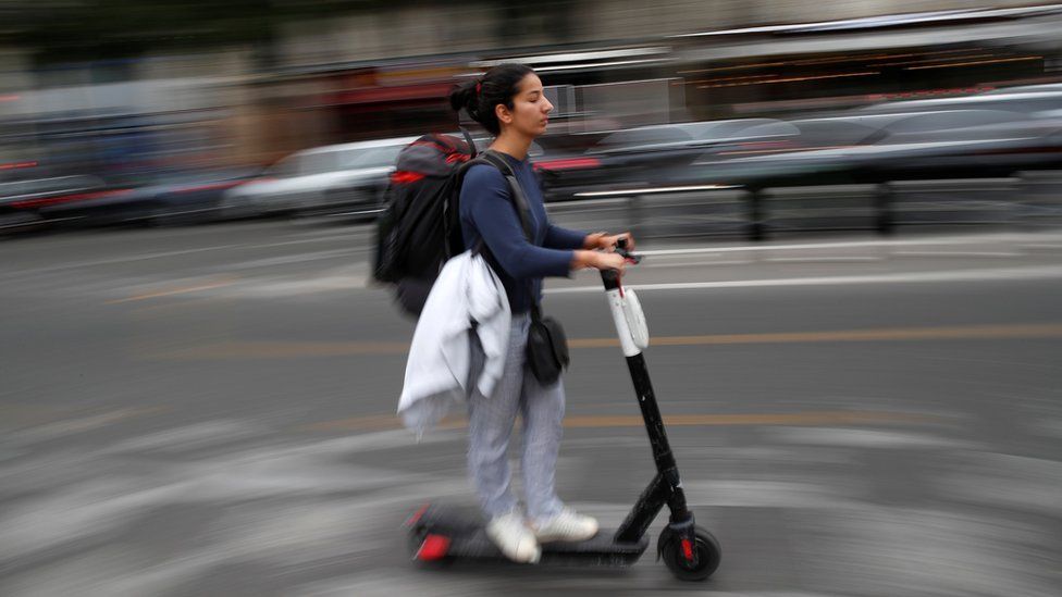 woman scooting during strike