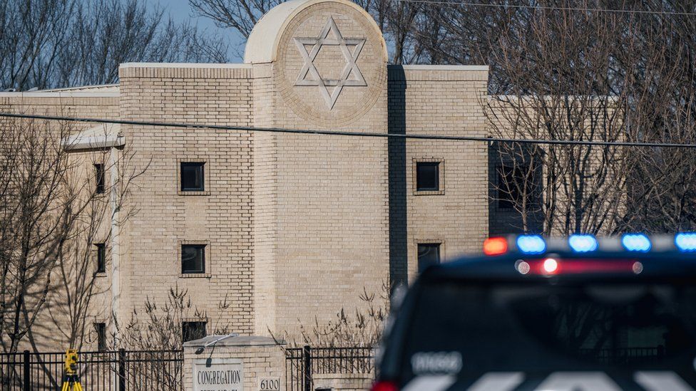 A law enforcement vehicle sits in front of the Congregation Beth Israel synagogue on January 16, 2022 in Colleyville, Texas