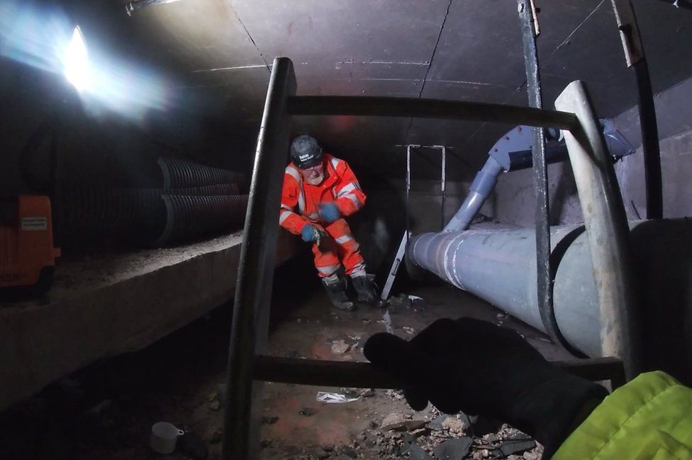 Specialists are working in hollow 'boxes' underneath the road where concrete and steel repairs are taking place