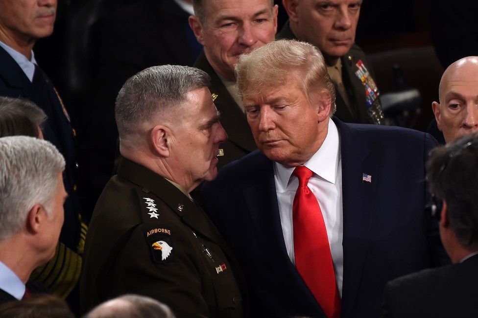 Chairman of the Joint Chiefs of Staff General Mark Milley chats with President Donald Trump