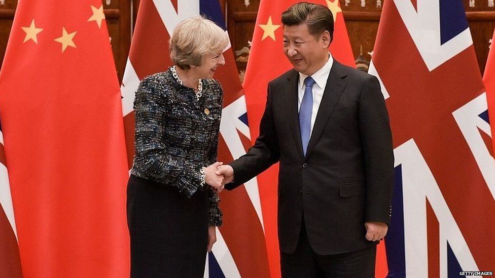 Theresa May meeting Chinese President Xi Jinping in 2016
