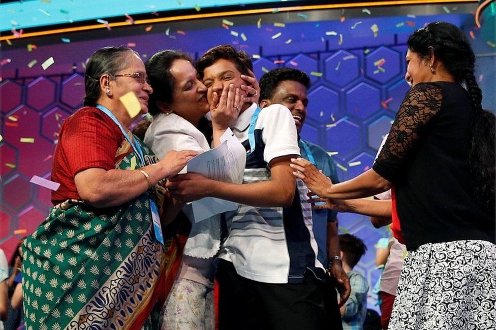Co-champion Jairam Jagadeesh Hathwar (C) and family members celebrate after final round at the 89th annual Scripps National Spelling Bee at National Harbor in Maryland U.S. May 26, 2016