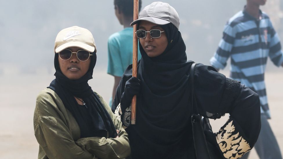 Two women at a protest in Khartoum, Sudan - Friday 3 June 2022