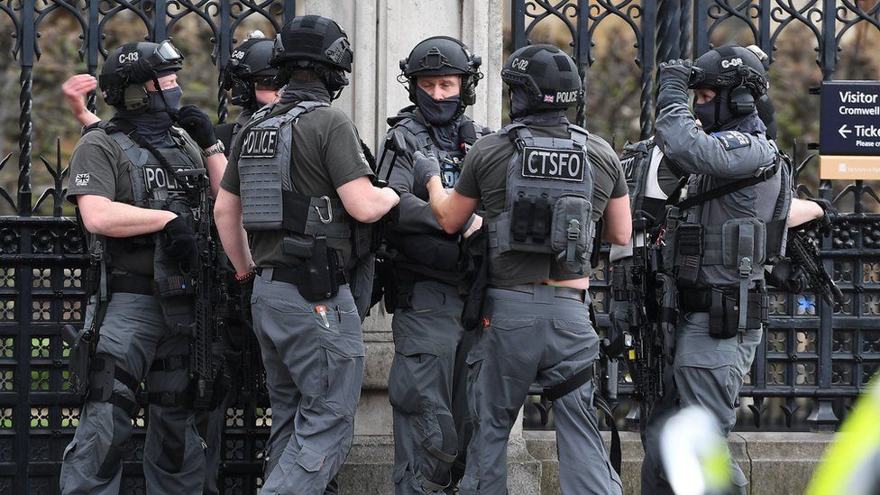 Counter-terrorism officers outside the Houses of Parliament
