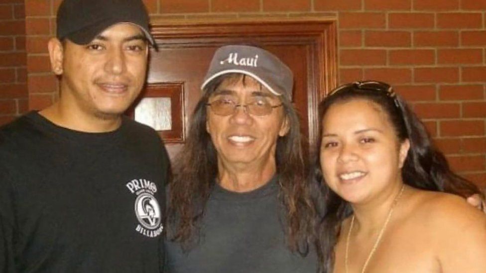 Buddy Jantoc (in the centre) with his family