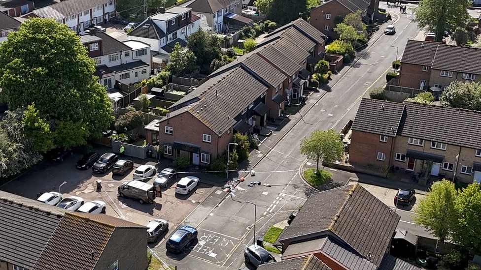 An aerial view of a police cordon at the scene