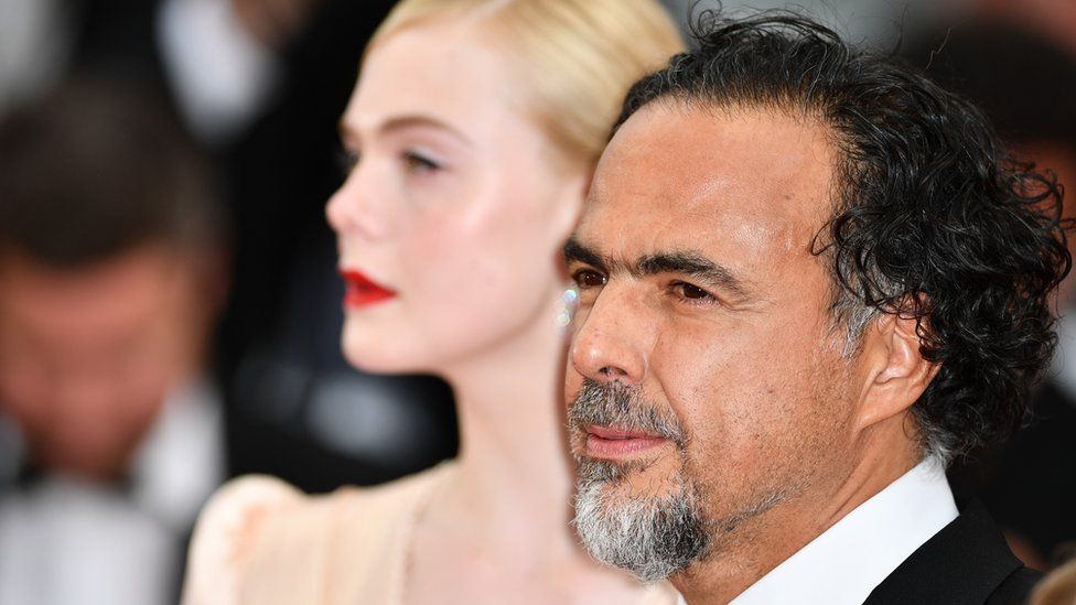 Alejandro González Iñárritu and Elle Fanning arrive for the screening of the film The Dead Don't Die and the Opening Ceremony at the 72nd annual Cannes Film Festival in Cannes, 14 May 2019