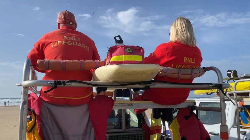 RNLI lifeguards patrolling in Brixham