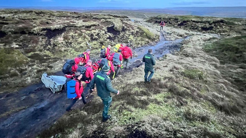 Glossop Mountain Rescue and paramedics from the North West Ambulance Service