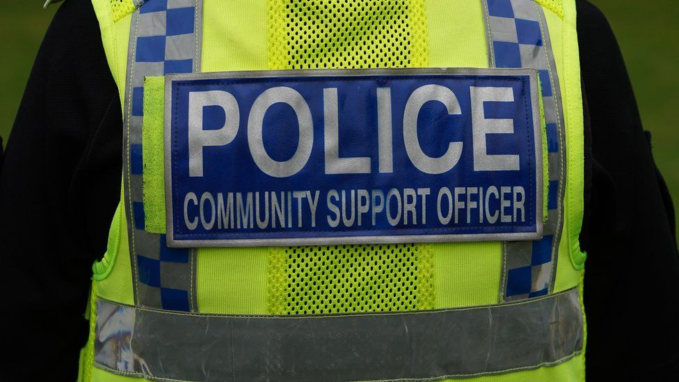 Close-up of police community support officer jacket