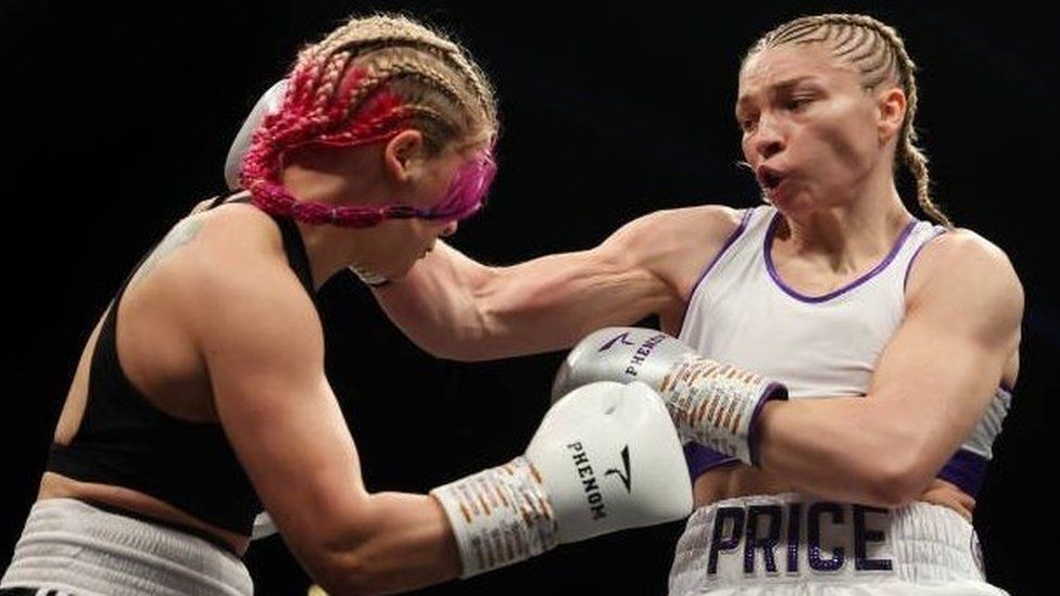 Lauren Price punches Valgerdur Gudstensdottir during fight night London in June 2022