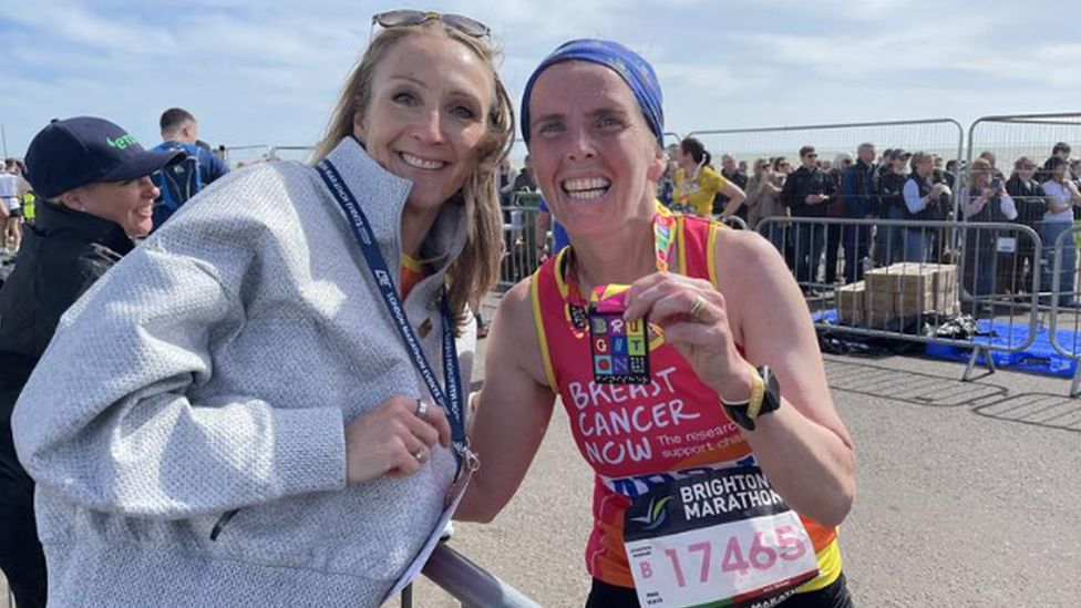 Paula Radcliffe and Apryl Hammett at the finish of the Brighton Marathon