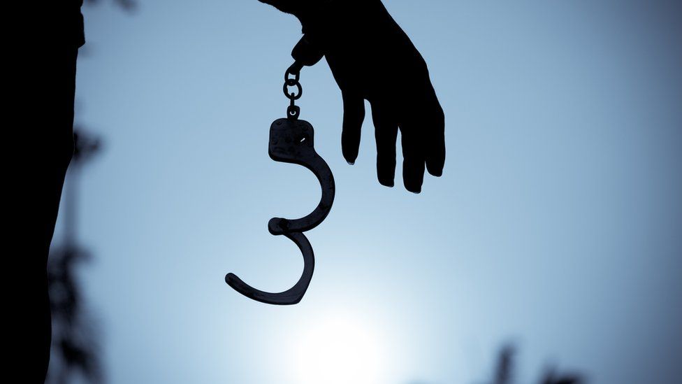 File photo of handcuffs removed