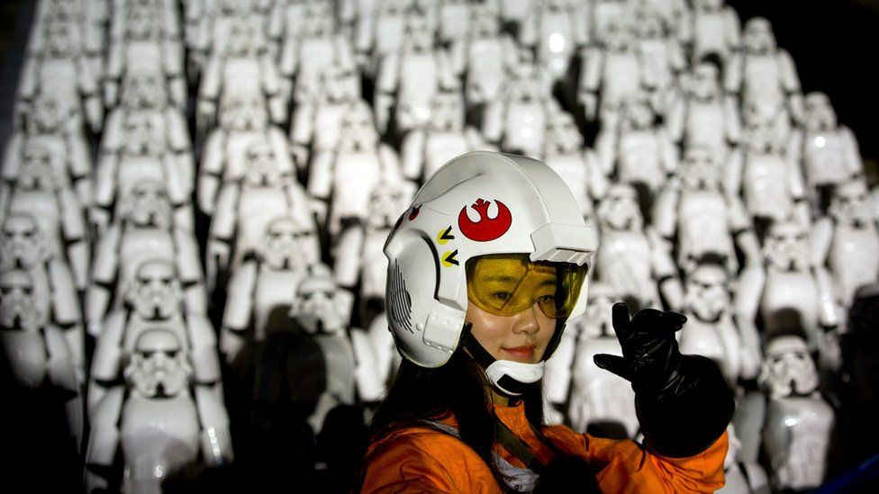 A Chinese Star Wars fan dressed in costume atop the Great Wall of China October 20, 2015.
