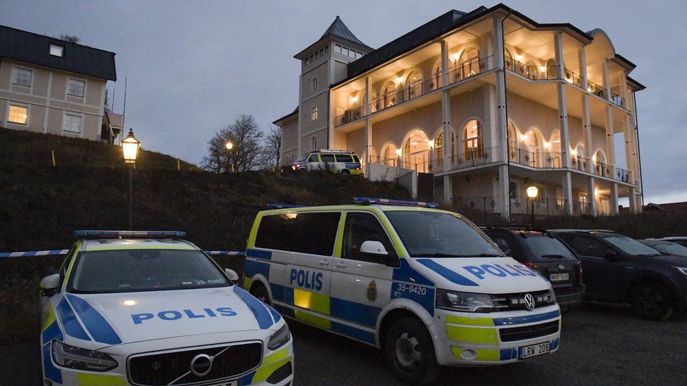 Police vehicles are seen near the premises of the Johannesbergs Castle in Rimbo, 50km north of Stockholm, Sweden, 4 December 2018