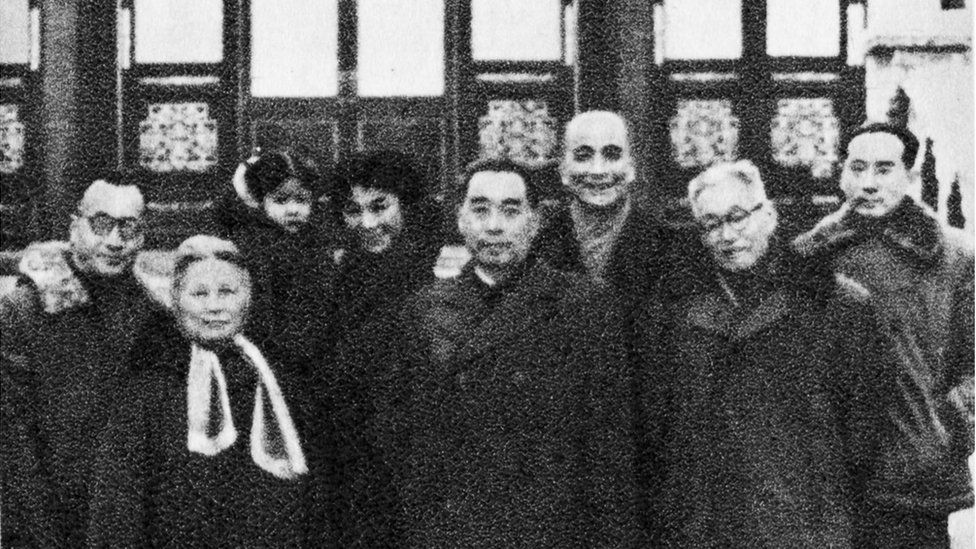 A large group, including the two now much older men - Zhou in the middle - photographed on 1 January 1959 in the Zhongnanhai compound in Beijing