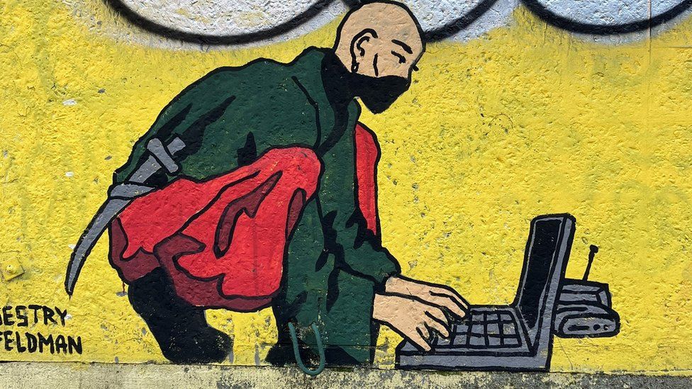 Hacker mural on streets of Kyiv
