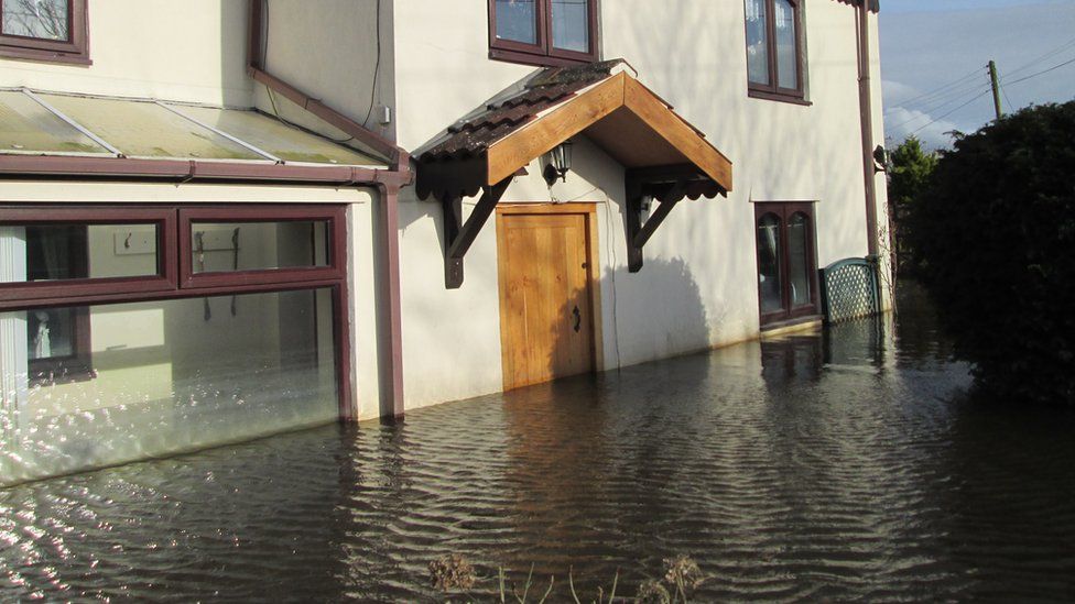 Floodwater high up on the house
