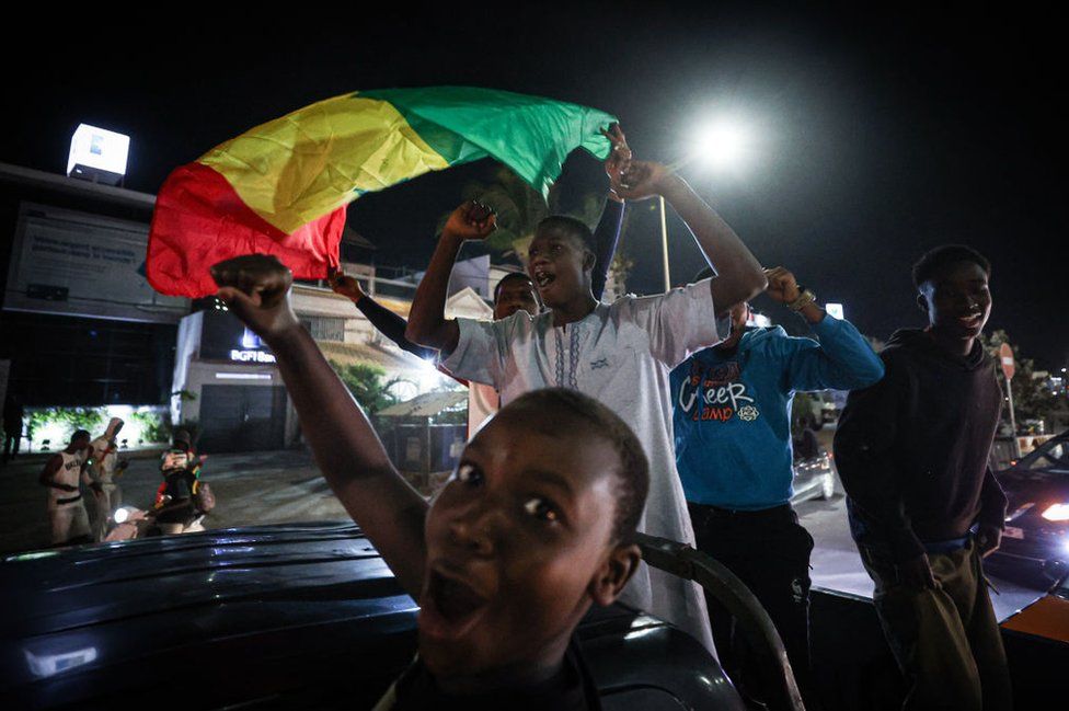 Supporters of Bassirou Diomaye Faye take to the streets for celebration as they prematurely proclaim victory while the votes are still being counted after the election in Dakar, Senegal on March 24, 2024.