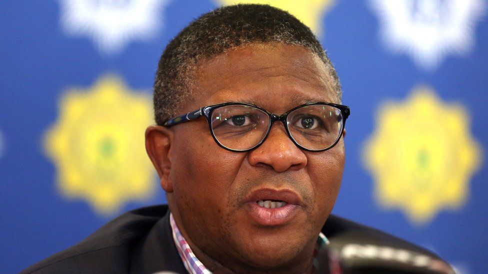 South African Police minister Fikile Mbalula gives a press briefing