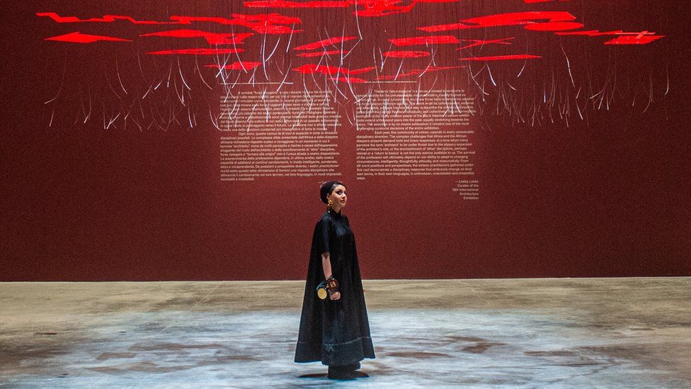 Curator Lesley Lokko pose for a portrait in front of the central pavilion "Force Majeure" at Giardini during the press preview of the 18th International Architecture Exhibition – La Biennale di Venezia on May 17, 2023 in Venice
