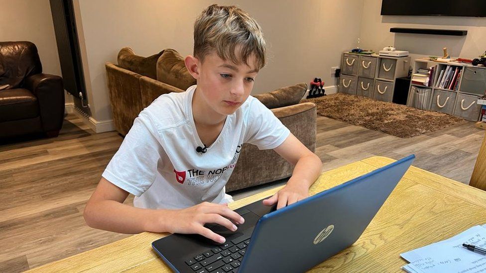 Elliot, a year 8 pupil at Myton School in Warwick, logs on for a day of remote learning on Tuesday morning