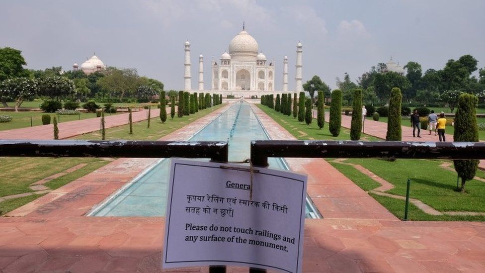A notice is tied to a railing inside the premises of Taj Mahal after authorities reopened the monument for visitors,