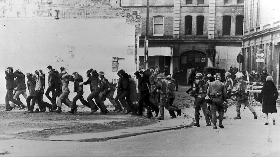 British paratroopers take away people in Londonderry on Bloody Sunday