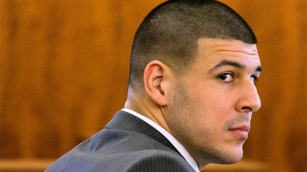 Former NFL player Aaron Hernandez looks at the prosecutor during his murder trial in Fall River, Massachusetts.