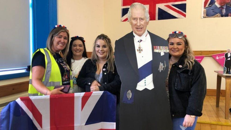 Many were delighted to have their picture taken alongside a giant cardboard cut out of King Charles