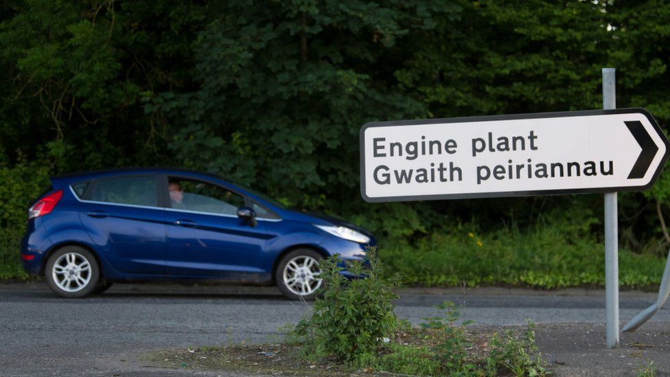 A Ford Fiesta next to the road sign for Bridgend Ford