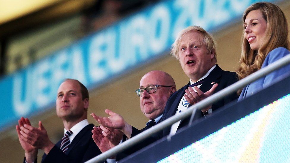Prince William, Duke of Cambridge, English Football Association chairman Peter McCormick, British Prime Minister Boris Johnson and his wife Carrie Johnson applaud after the UEFA EURO 2020 semi final between England and Denmark in London, Britain, 07 July 2021