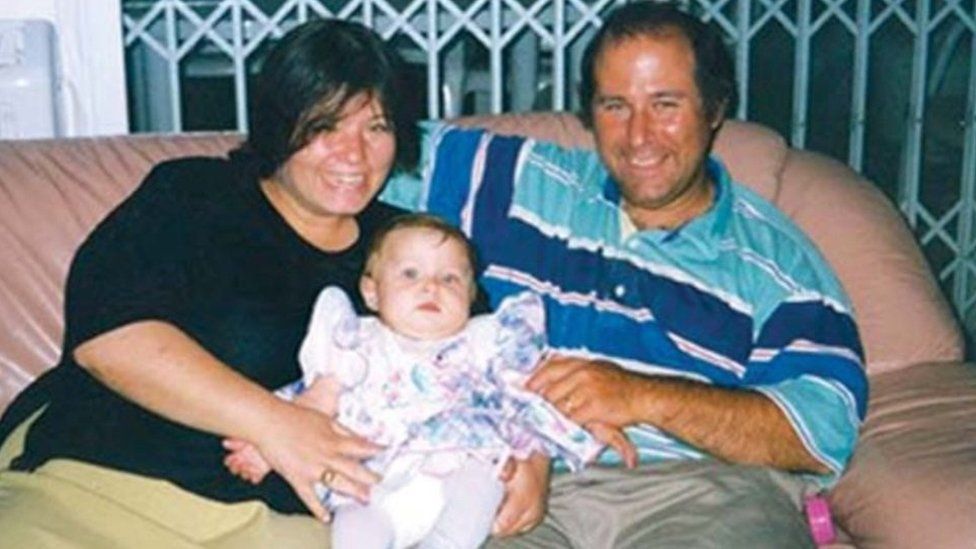 Chana Nachenberg with her husband, David, and then baby daughter