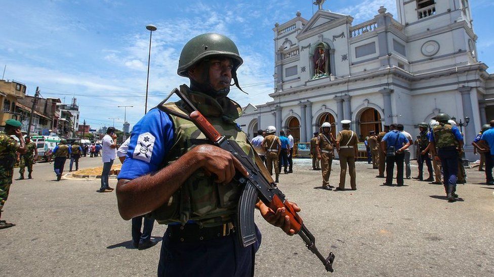 Sri Lankan security forces secure the area around St. Anthony's Shrine after an explosion hit St Anthony's Church in Kochchikade
