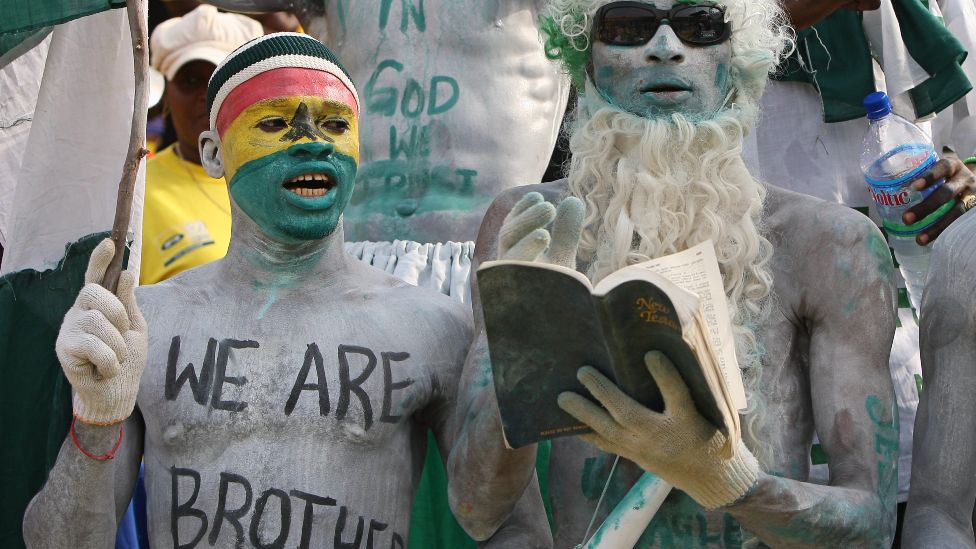 A Ghanaian and Nigerian football fans at the Africa Cup of Nations quarter final match between Ghana and Nigeria in Accra, Ghana - February 2008