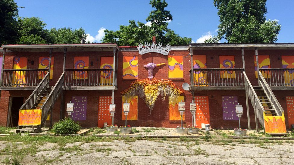 An abandoned apartment complex was painted in an attempt to beautify the neighbourhood