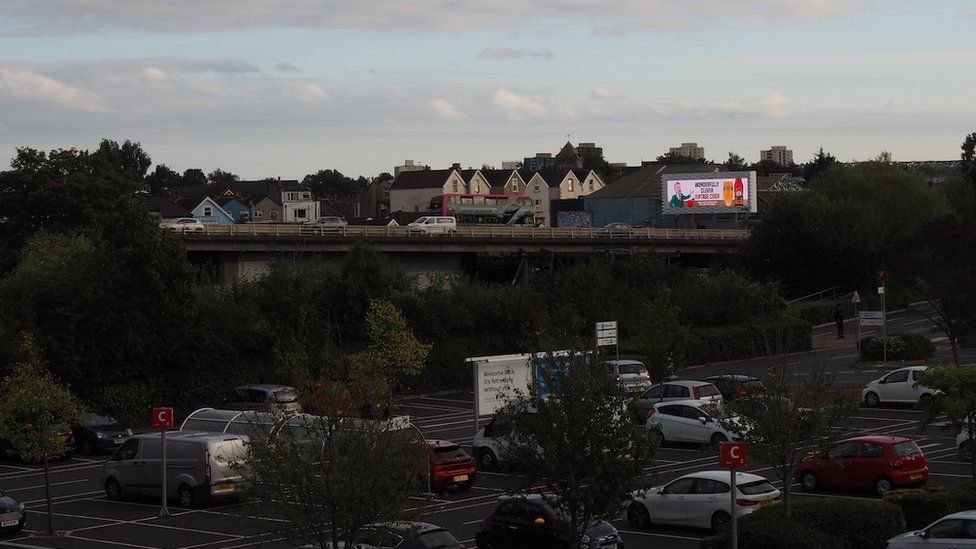 Advertising screen overlooking the M32