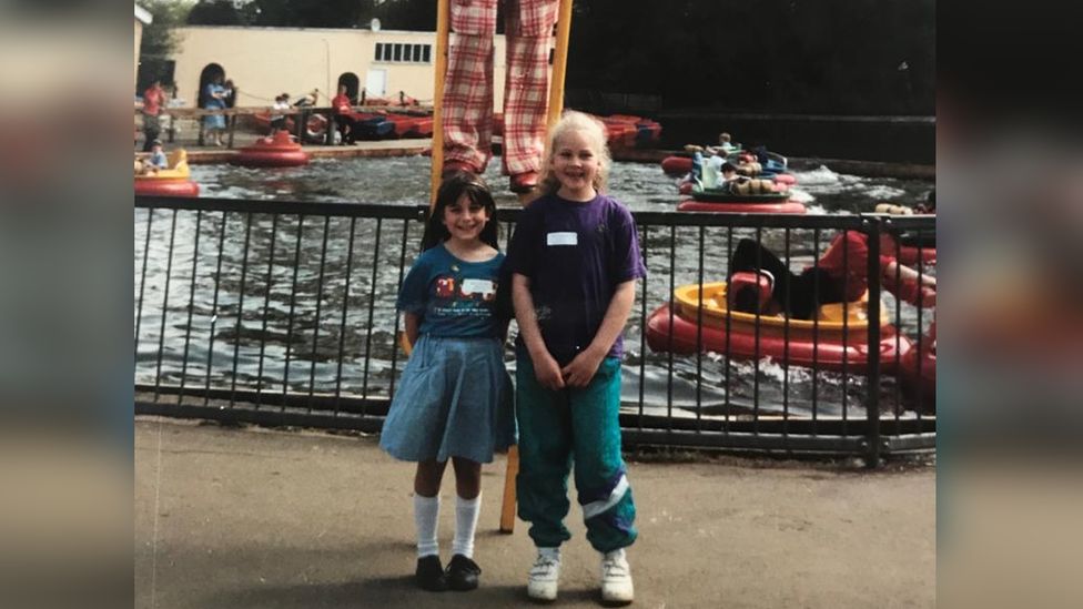 Lucy Elliot with her friend Christine Sansford at the park as a child
