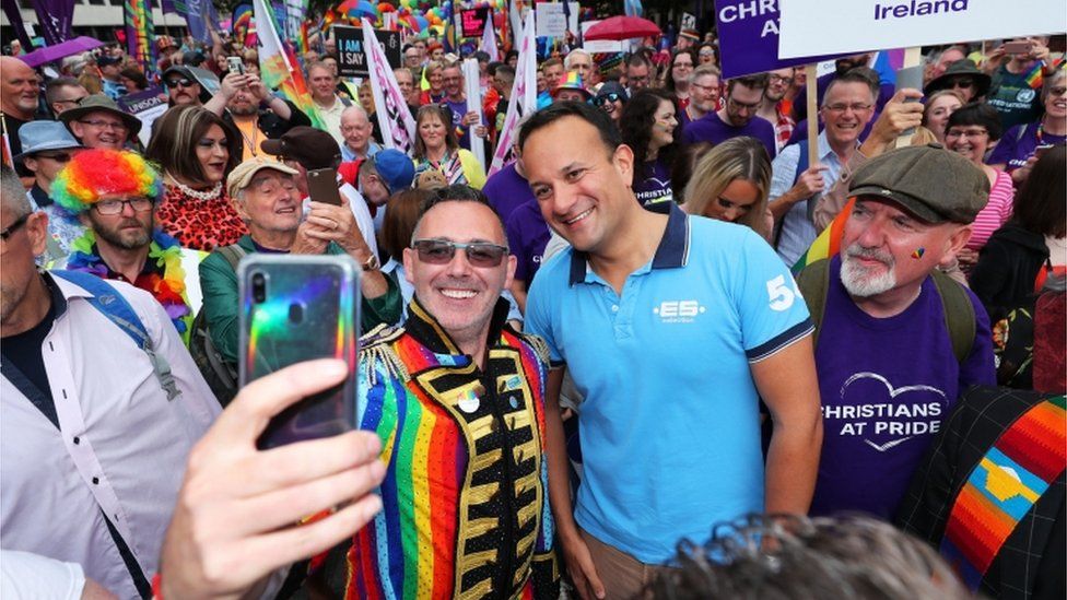 A Pride-goer grabs a selfie with taoiseach (Irish prime minister) Leo Varadkar