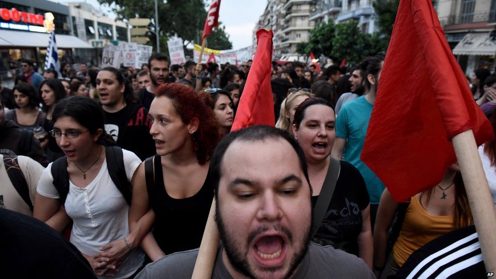 Demonstrators shout slogans during a rally by supporters of the "No" vote to the upcoming referendum in the northern Greek port city of Thessaloniki,